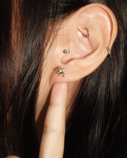 Sterling silver one-horned beetle earring